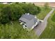 Picturesque aerial view of the home, enveloped by lush greenery and a well-maintained lawn at 8555 S County Road 375 E, Mooresville, IN 46158