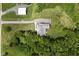 Expansive aerial view of the property, showcasing the house, garage, and surrounding greenery at 8555 S County Road 375 E, Mooresville, IN 46158