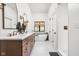 Bright bathroom featuring double vanity, large soaking tub, and a separate shower at 8555 S County Road 375 E, Mooresville, IN 46158