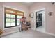Charming bedroom with a view of the laundry room and featuring a dollhouse and natural light at 8555 S County Road 375 E, Mooresville, IN 46158