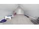 Spacious bonus room featuring vaulted ceilings and ample space for recreation or a home gym at 8555 S County Road 375 E, Mooresville, IN 46158