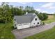 Beautiful two-story home featuring a three-car garage and an expansive driveway and front yard at 8555 S County Road 375 E, Mooresville, IN 46158