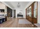 Inviting foyer with wood floors, statement lighting, and elegant decor at 8555 S County Road 375 E, Mooresville, IN 46158