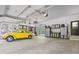 Spacious garage with ample storage, car, room for bikes and tools at 8555 S County Road 375 E, Mooresville, IN 46158