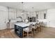 Expansive kitchen offers an island with bar seating, pendant lighting, and sleek cabinetry at 8555 S County Road 375 E, Mooresville, IN 46158
