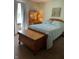 Cozy bedroom with wood furniture and soft lighting, creating a tranquil and comfortable retreat at 8655 Chateaugay Dr, Indianapolis, IN 46217