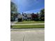 Beautiful home with lush green lawn and a well-maintained landscape at 8655 Chateaugay Dr, Indianapolis, IN 46217