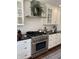 Beautiful kitchen featuring stainless steel appliances and white subway tile at 8655 Chateaugay Dr, Indianapolis, IN 46217