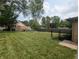 Spacious, fenced backyard with manicured lawn and potential for outdoor activities and landscaping at 895 W Poplar St, Zionsville, IN 46077