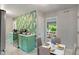 Cozy kitchen with colorful cabinets, stainless steel appliances, and a dining area with marble floors at 895 W Poplar St, Zionsville, IN 46077