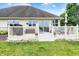Backyard deck with furniture overlooking the lawn at 896 Fairfield Dr, Greenfield, IN 46140