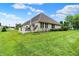 Well-maintained backyard with a white deck, bordered by landscaping, offering outdoor relaxation at 896 Fairfield Dr, Greenfield, IN 46140