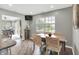 Dining room area with a large window and view of the lake at 896 Fairfield Dr, Greenfield, IN 46140