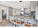 Modern kitchen features a large island, stainless steel appliances, and a seamless connection to the living areas at 896 Fairfield Dr, Greenfield, IN 46140