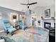 Comfortable living room with stylish fireplace, vaulted ceilings, and modern decor at 896 Fairfield Dr, Greenfield, IN 46140
