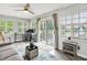 Inviting living space that offers a tranquil view of the serene pond with a fountain at 896 Fairfield Dr, Greenfield, IN 46140