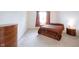 A cozy bedroom with natural light, featuring a comfortable bed and modern furnishings at 9117 Thoreau Ct, Fishers, IN 46037