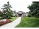 Community clubhouse boasts charming curb appeal with manicured landscaping at 9117 Thoreau Ct, Fishers, IN 46037