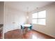 Dining area offering wood floors, a bright window, and closet doors at 9117 Thoreau Ct, Fishers, IN 46037