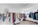 Spacious walk-in closet with ample storage, wire shelving, and clothing racks for organizing wardrobe at 9717 Chuckwalla Pl, Fishers, IN 46040