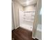 New bathroom featuring a clean, bright white shower with shelves, next to soaking tub at 9903 Deep Royal Way, Indianapolis, IN 46239