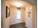 Welcoming entryway featuring hardwood floors, neutral paint, and charming decor accents for a cozy first impression at 9903 Deep Royal Way, Indianapolis, IN 46239
