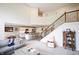 Open-concept living room showcasing seamless flow to the kitchen, ideal for entertaining and Gathering gatherings at 9903 Deep Royal Way, Indianapolis, IN 46239