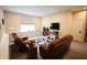 Carpeted living room with recessed lighting, comfortable leather recliners, and large rug at 9903 Deep Royal Way, Indianapolis, IN 46239