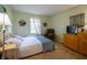 Cozy bedroom with natural light, hardwood floors, and a comfortable aesthetic at 1052 Barley Cir, Carmel, IN 46032