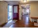 Welcoming entryway with hardwood floors and a view leading into the bright kitchen at 1052 Barley Cir, Carmel, IN 46032