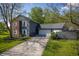 Charming home with beautiful yard, brick and vinyl siding and three car garage at 1052 Barley Cir, Carmel, IN 46032