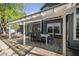 Private patio with pergola, dining area, and seating at 1052 Barley Cir, Carmel, IN 46032