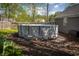 Backyard features a round above ground pool with ladder, perfect for relaxing and cooling off at 1052 Barley Cir, Carmel, IN 46032