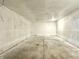 Spacious unfinished basement featuring concrete floor, white walls, and an open layout at 106 S Hancock St, Waynetown, IN 47990