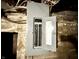 Electrical panel box mounted on a basement wall with stone construction and visible conduit at 106 S Hancock St, Waynetown, IN 47990