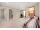 Comfortable bedroom with neutral carpeting and plenty of natural light at 1065 Bent Branch Ln, Greenwood, IN 46143