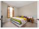 Well-lit bedroom with neutral carpeting and a view at 1065 Bent Branch Ln, Greenwood, IN 46143