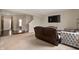 Spacious living room featuring neutral carpet, comfortable seating, and an open layout to the entrance and stairs at 1065 Bent Branch Ln, Greenwood, IN 46143