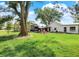 Large backyard featuring a play area, perfect for outdoor activities and Gathering gatherings at 10854 E 700 N, Wilkinson, IN 46186