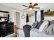 Comfortable bedroom with ceiling fan, stylish decor, and soft natural light creating a cozy ambiance at 10854 E 700 N, Wilkinson, IN 46186