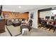 Comfortable living room with a sectional sofa and adjacent office area with a desk and chair at 10854 E 700 N, Wilkinson, IN 46186