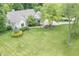 Aerial view of the home showing the large yard, mature trees and landscaping at 11020 Florida Rd, Fortville, IN 46040