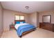 Comfortable bedroom with carpet, window, bed and dresser at 11020 Florida Rd, Fortville, IN 46040
