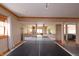 Game room with ping pong table and views to an office and other living areas at 11020 Florida Rd, Fortville, IN 46040