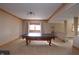 Game room with a ping pong table and carpeted flooring at 11020 Florida Rd, Fortville, IN 46040