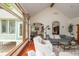Bright living room featuring a large window and comfortable seating arrangement at 11020 Florida Rd, Fortville, IN 46040