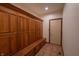 Mud room featuring storage with cubbies and bench seating near the home's entry at 11020 Florida Rd, Fortville, IN 46040