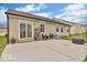 A concrete patio with grill and seating, perfect for enjoying time outdoors at 123 Campus Ln, Greenwood, IN 46143
