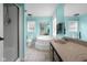 Bright bathroom featuring a soaking tub, sink, toilet and tiled floors and colorful walls at 12383 S 25 W, Columbus, IN 47201