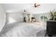 Expansive living area with gray carpet and a unique fireplace at 12383 S 25 W, Columbus, IN 47201
